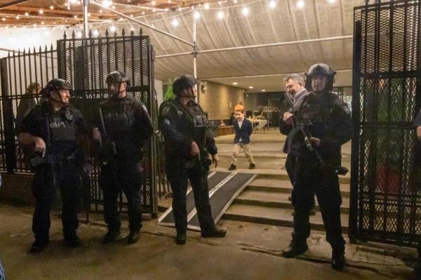 Cops outside synagogue.